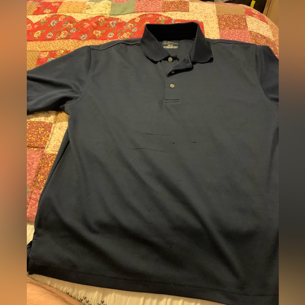 PGA tour polo . Dark blue.  Size is a small